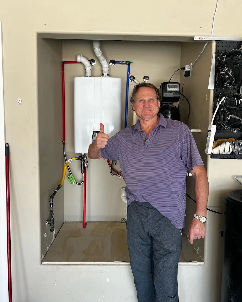 Satisfied customer with licensed plumber from Free Flow Plumbing after successful repair in St. George Utah